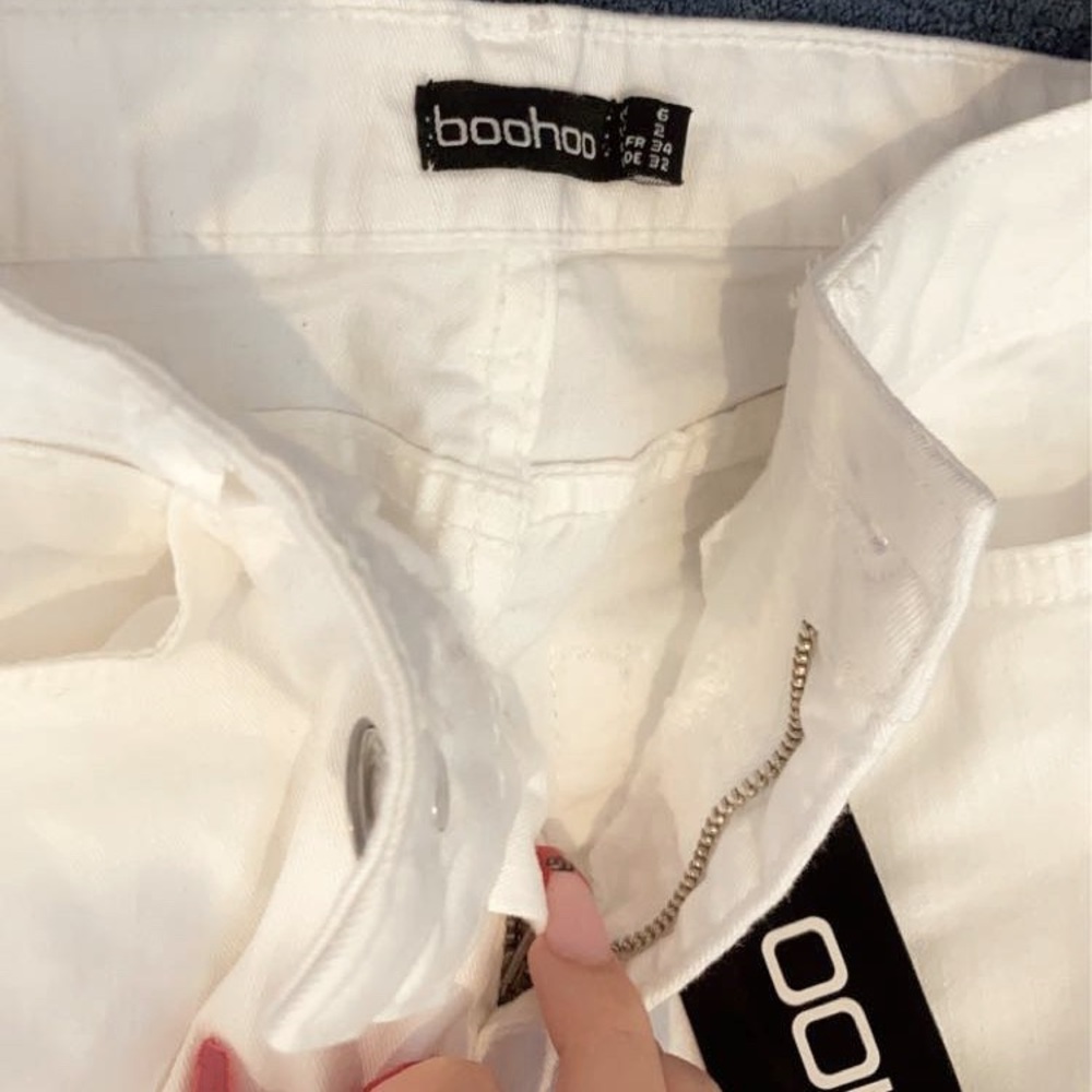 Brand new white jeans never worn, With tag on them